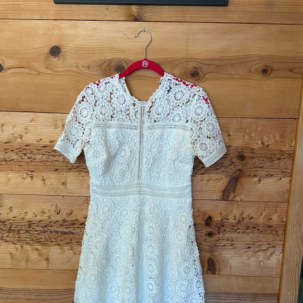 Crochet white dress very delicate. Worn one time